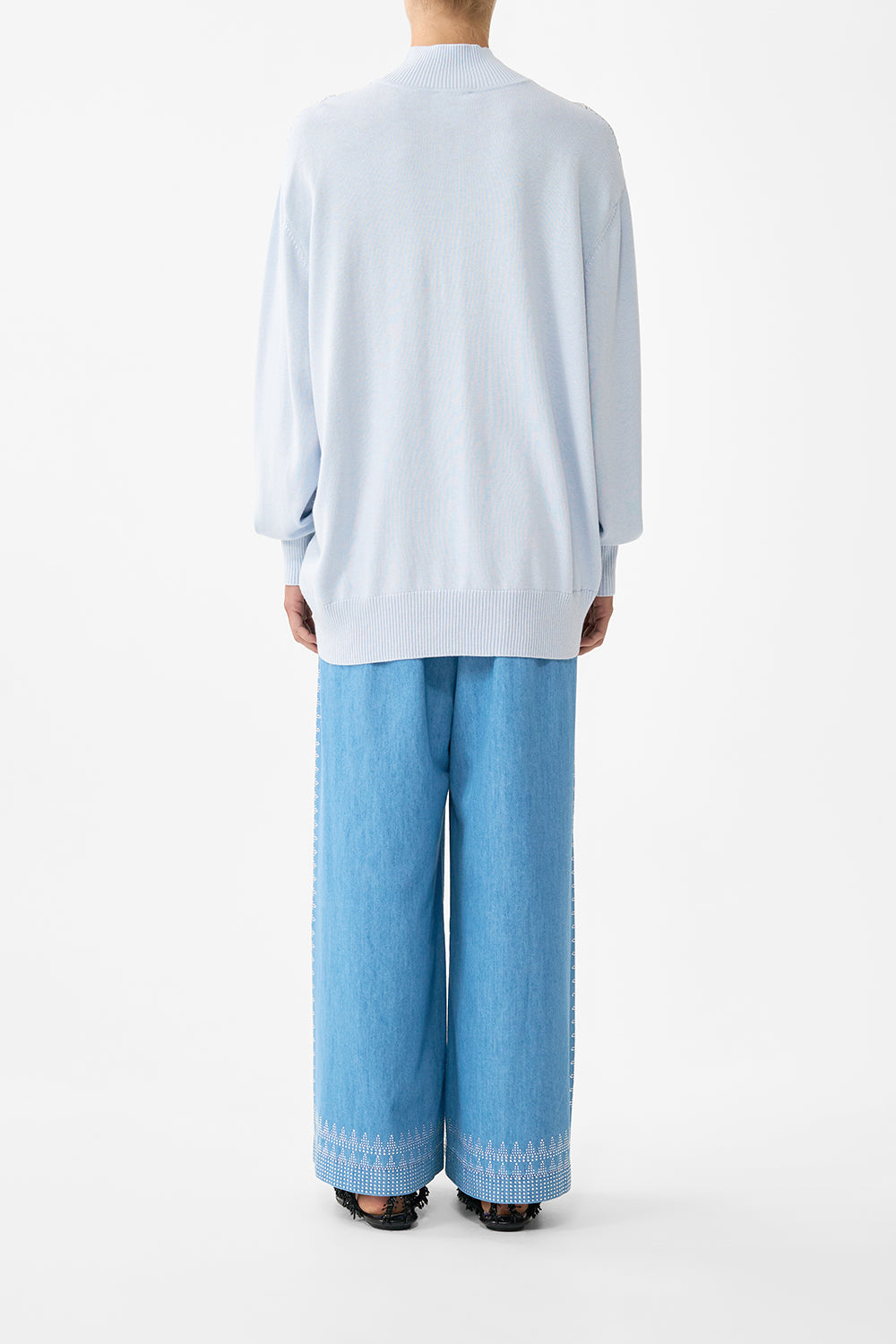 The CAMILLA SILK FRONT TURTLE NECK KNIT THE HUM OF THE ALHAMBRA