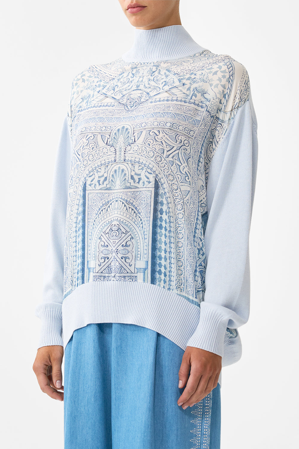 The CAMILLA SILK FRONT TURTLE NECK KNIT THE HUM OF THE ALHAMBRA