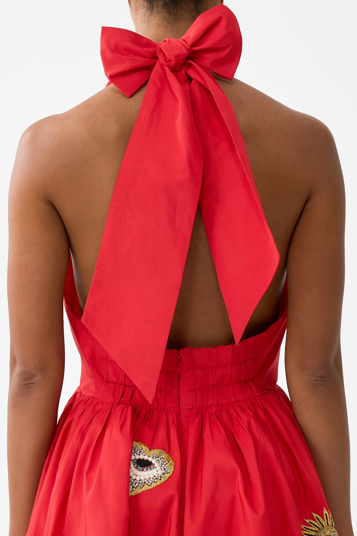 The CAMILLA RUFFLE HEM HALTER SHORT DRESS NAZAR NIRVANA