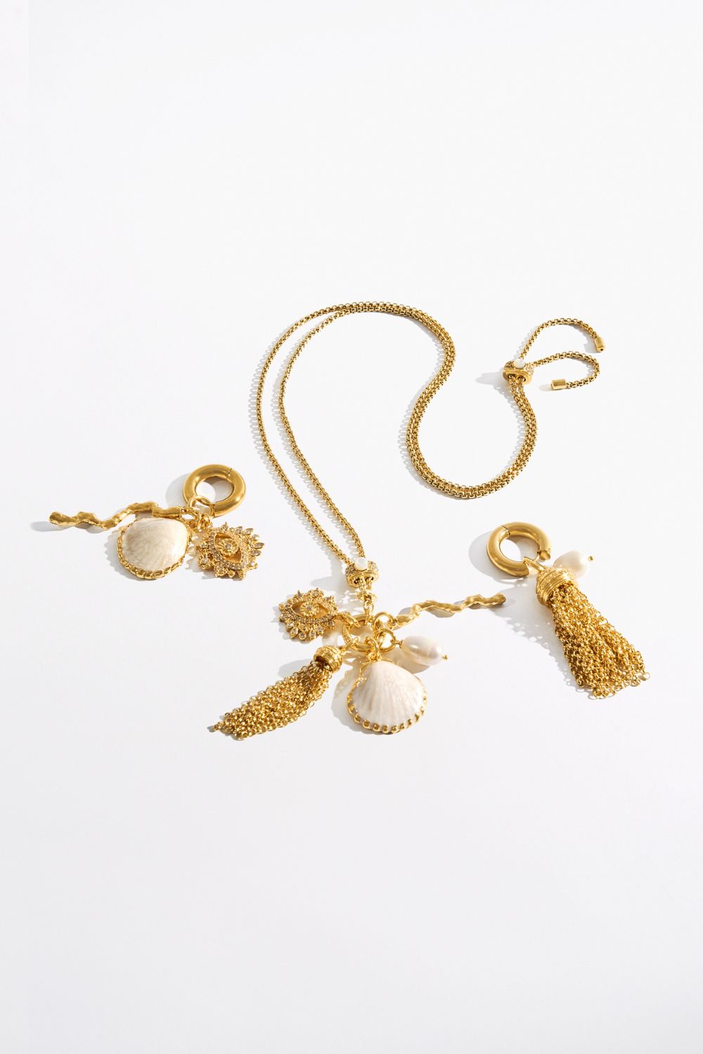 The CAMILLA ENCHANTED OCEANIA ASYMMETRICAL DROP EARRINGS GOLD