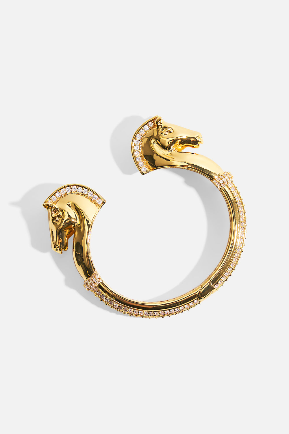 The CAMILLA SAVAGE BEAUTY HORSE BANGLE GOLD