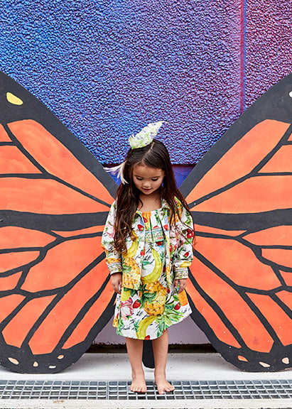 THERES NO PLACE LIKE RIO KIDS RUFFLE DRESS