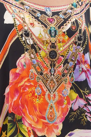 Detail view of model wearing CAMILLA silk kaftan in Secret History floral print