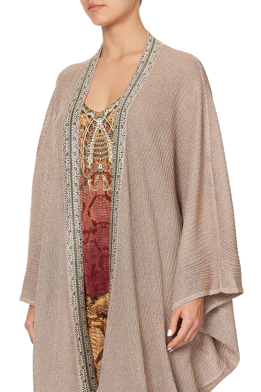 METALLIC KNIT PONCHO WITH TASSELS COASTAL TREASURE